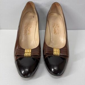 Salvatore Ferragamo Women's Brown and Black Flats with Gold‎ Detail and a bow